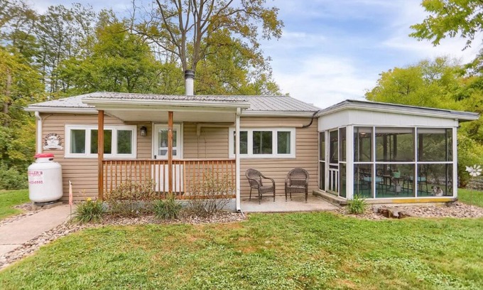 Swengel Cabin | Waterfront cottage with hot tub, & fire pit. Pet friendly.