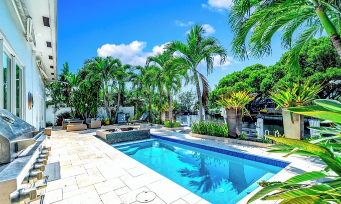 Coral Ridge Isles House | Waterfront Gem! HTD Pool+Hot Tub! 1 Mile To Beach!