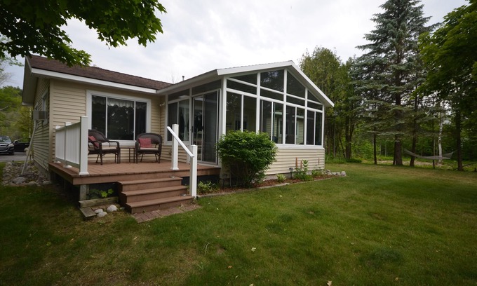 Lake Leelanau House | Waterfront home Lake Leelanau. Enclosed porch, WIFI. Canoe, row boat Dog ok.