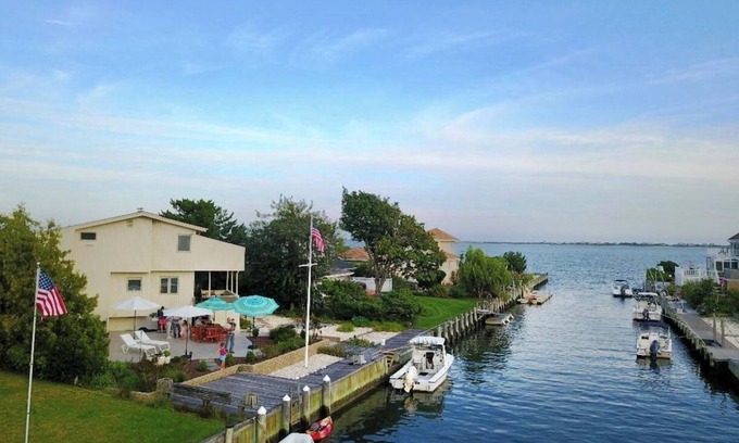 East Quogue House | Waterfront in the Hamptons. Summer 2026 dates available now.