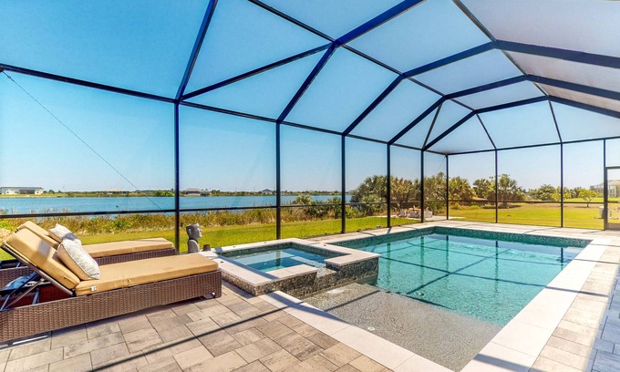 Southside Rural Community House | Waterfront modern home with pool & hot tub