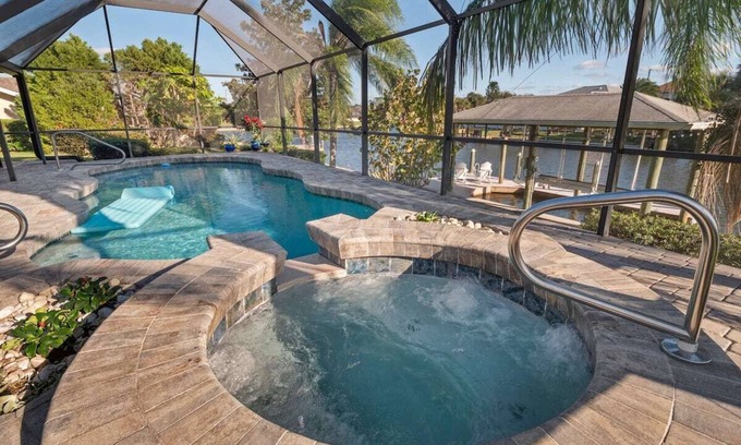 Palm Harbor House | Waterfront/Pool/Hot Tub/Dock/Game Room - Close to Beach