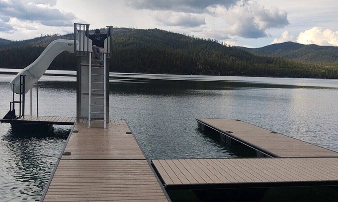 Kalispell House | Waterfront w/ Water Slide, Rock Climbing Wall & Ice Fishing Shanty in Winter