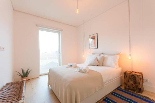 Sao Paulo Apartment | Wave of Light in Lisbon by Innkeeper