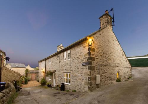 Eyam House | West end cottage and shippon