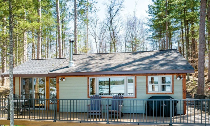 Spooner Cabin | Western exposure with sand frontage