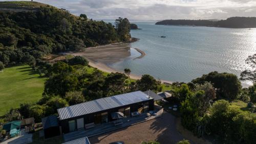 Omiha Villa | Wharetana Bay Villa with private walkway to beach!