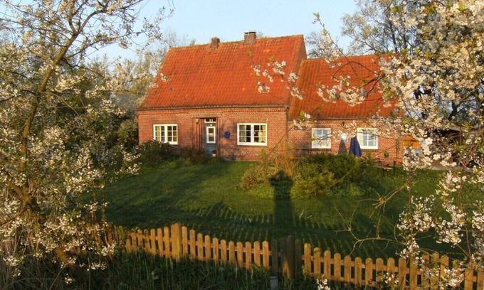 Neuharlingersiel House | Wonderful cottage with nature garden and fireplace, near ocean