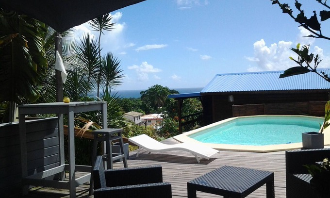 Capesterre-Belle-Eau House | wooden bungalow with nice sea view