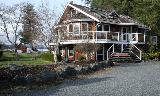 Fanny Bay House | Wraparound Deck w/Ocean and Mountain Sunset Vista
