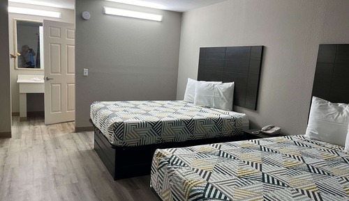Deluxe Suite, 2 Queen Beds, Non Smoking, Refrigerator & Microwave