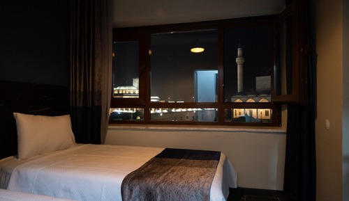Deluxe Quadruple Room, City View