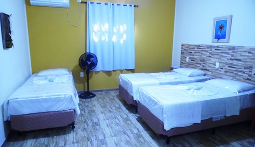 Quarto Triplo-Luxo-Ar