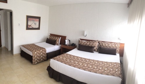 Standard Double Room (2 camas 2 adultos + 1 niño)