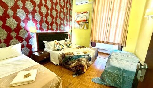 Quadruple Room with Shared Bathroom