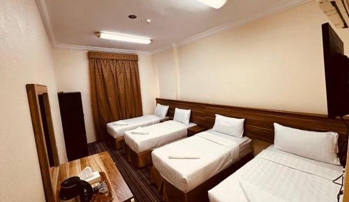 Quadruple Room with Private Bathroom