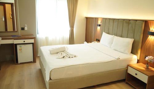 Double Room (1 Adult + 1 Child)