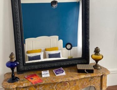 Queen Room with Shared Bathroom