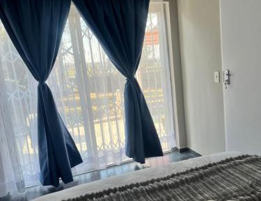Queen Room with Shared Bathroom
