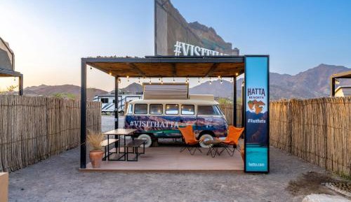 Vintage Campers with Mountain Backdrop and Complimentary Adventure Activities