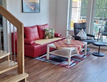 Four-Bedroom Apartment with Balcony 