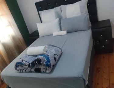 Queen Room with Shared Bathroom