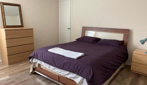Queen Room with Shared Bathroom