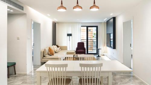 Three-Bedroom Premium Apartment with Balcony