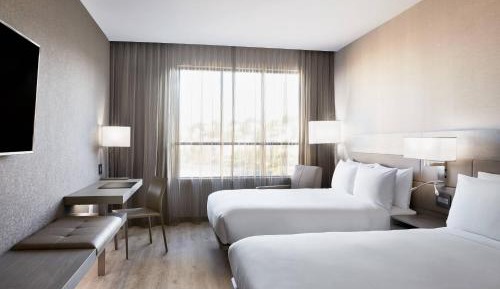 Queen Room with Two Queen Beds and Partial Water View