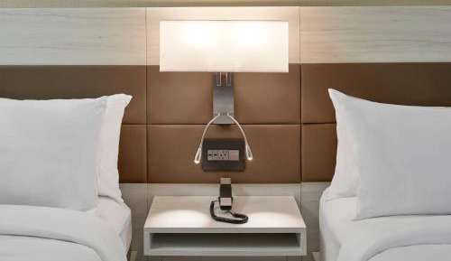 Corner Room with Two Queen Beds and City View