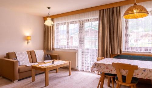 One-Bedroom Apartment with Balcony and City View