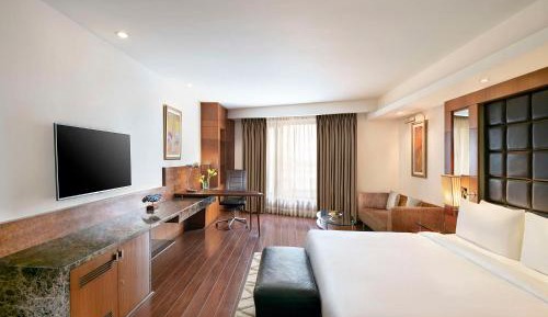 Deluxe Room with Happy Hours 03:00 PM to 06:00 PM,1+1 & one way Airport Transfers and Free Pick up and drop to Worldmark Aerocity (subject to car availability)