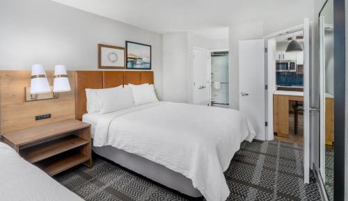 Queen Suite with Two Queen Beds and Sofa Bed