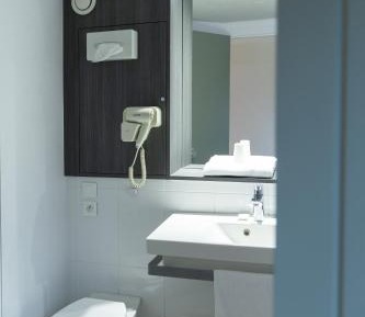 Triple Room (1 Double Bed + 1 Single Bed)