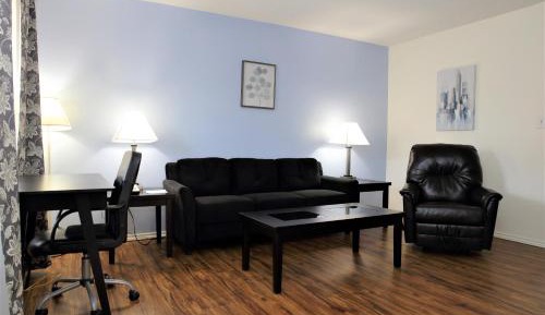 Deluxe Suite with Two Double Beds and Sofa Bed