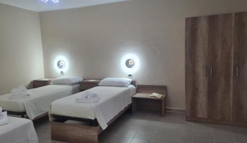 Quadruple Room with Private Bathroom