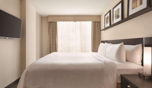 Two-Bedroom Presidential Suite with One Queen and Two Double Beds