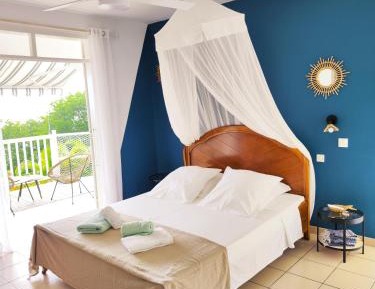  HYLODE'S SONG studio avec piscine face aux ilets pigeon