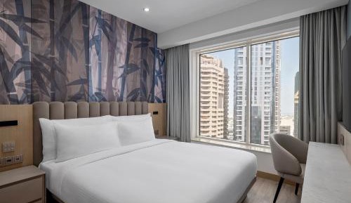 One Bedroom Suite with 1 Queen Bed - City View - Includes 20% Off Food & Beverage