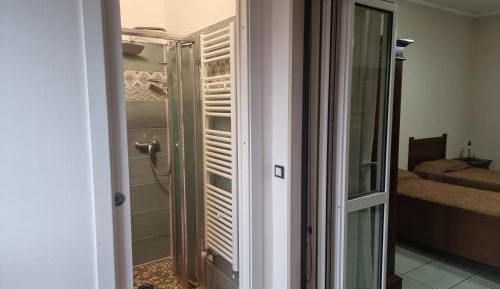 Quadruple Room with Private Bathroom