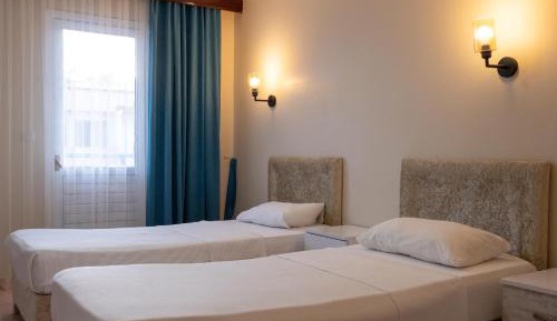 Economy Quadruple Room with Shared Bathroom