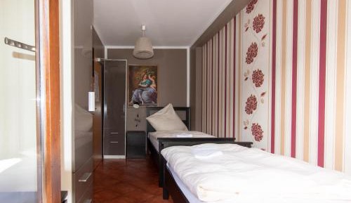 Twin Room with Balcony and Shared Bathroom