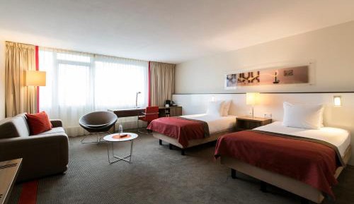 Twin Suite with Two Single Beds and Sofa Bed