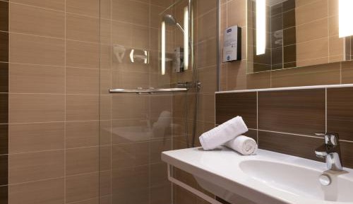 Triple Room with 3 single beds with Mezzanine (2 Adults + 1 Child)