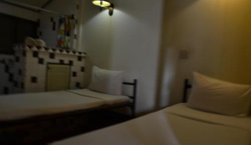 Quadruple Room with Shared Bathroom