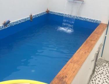 Three-Bedroom Apartment with Pool 