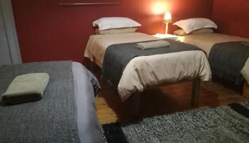 Economy Quadruple Room with Shared Bathroom