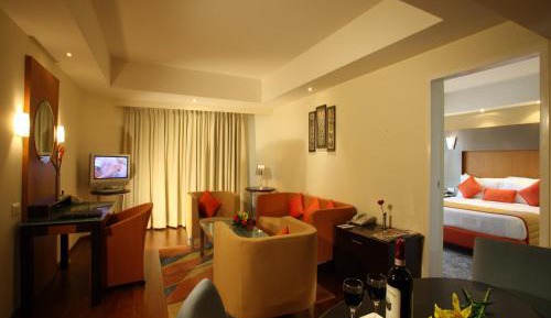 Premium Suite with 20% discount on InRoom Dinning, Happy hours 11 AM to 11 PM, Buy two get one free on select beverages (Hard Liquor only), Applicable in Room Service and BAR from 11 am to 11 pm.