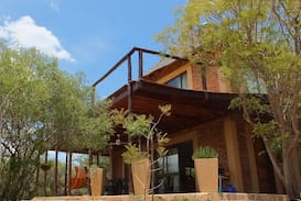 Tshwane House | Baobab Green Room - NUDE - SunEden Naturist Resort