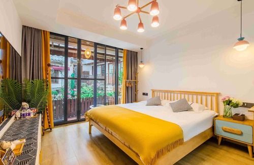 Xihu Bed & Breakfast | Moonlit Orchid Bay Coffee & Tea